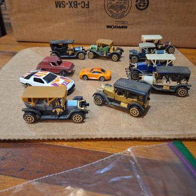 mixed lot fo pocket size cars, not hotwheels except the orange micro machine
