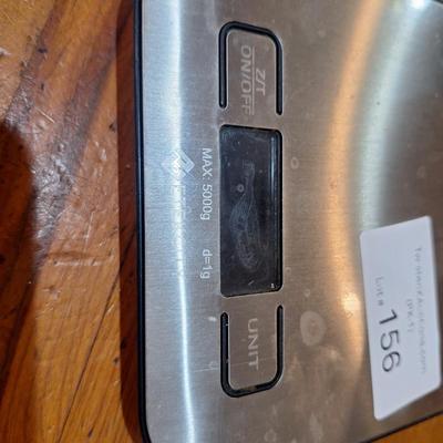 small scale with capacity of 11 lbs- no battery cover