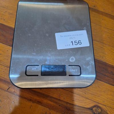 small scale with capacity of 11 lbs- no battery cover