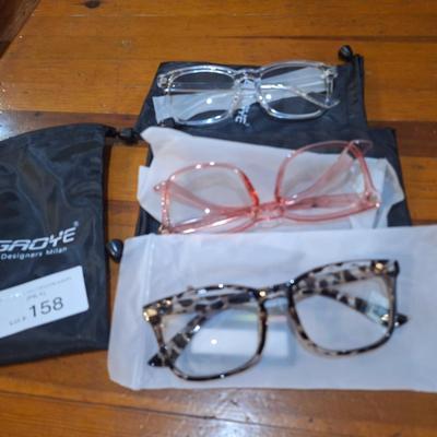  GROYE Designers Milan blue light blocking glasses in clear, pink, and leopard print frames. 