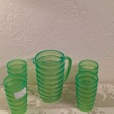 Emerald green acrylic or plastic pitcher and tumblers