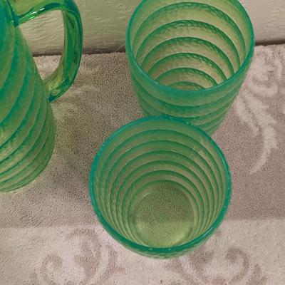 Emerald green acrylic or plastic pitcher and tumblers