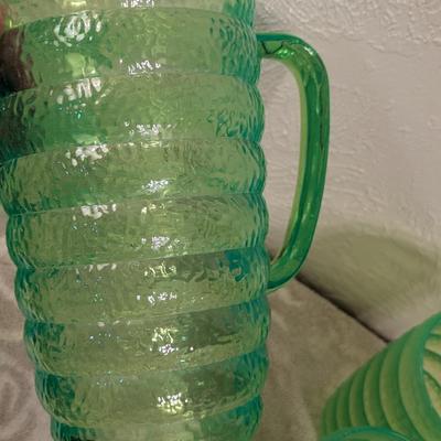 Emerald green acrylic or plastic pitcher and tumblers