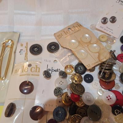lots of buttons and misc other items mixed in
