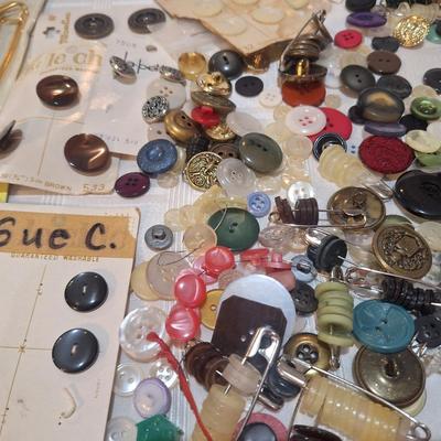 lots of buttons and misc other items mixed in