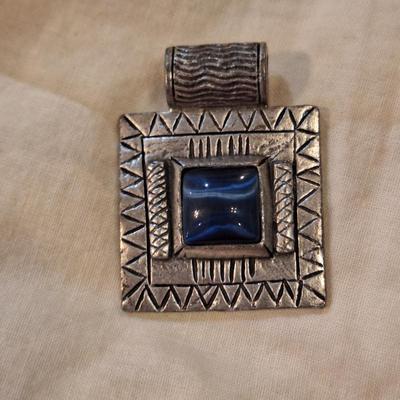 square silver tone pendnant with blue stone- no markings