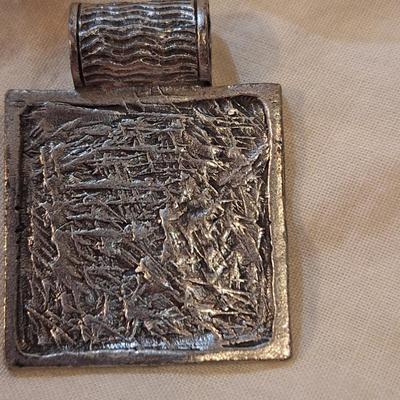 square silver tone pendnant with blue stone- no markings