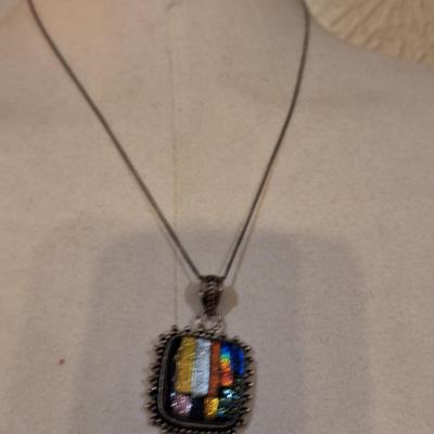 Sterling silver pendant with multi color glass or other stone inlays