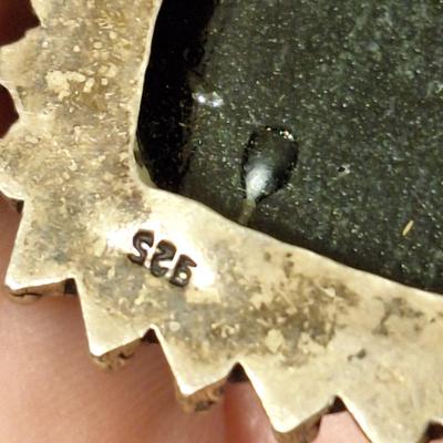 Sterling silver pendant with multi color glass or other stone inlays