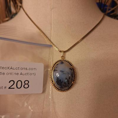 oval pendant on gold tone setting and necklace (not marked )