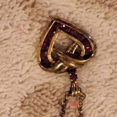 heart shaped pendant and chain.