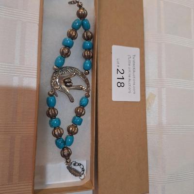 SW style bracelet with the ASL symbol for I love you. 