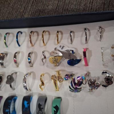 collection of various rings, silicone fashion rings and other