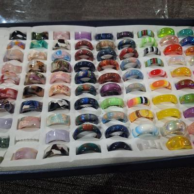 collection of various rings, silicone fashion rings and other
