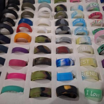 collection of various rings, silicone fashion rings and other