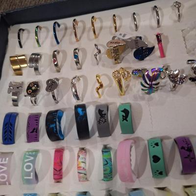 collection of various rings, silicone fashion rings and other