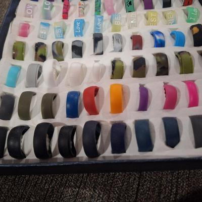 collection of various rings, silicone fashion rings and other
