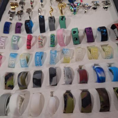 collection of various rings, silicone fashion rings and other