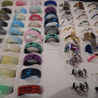 collection of various rings, silicone fashion rings and other