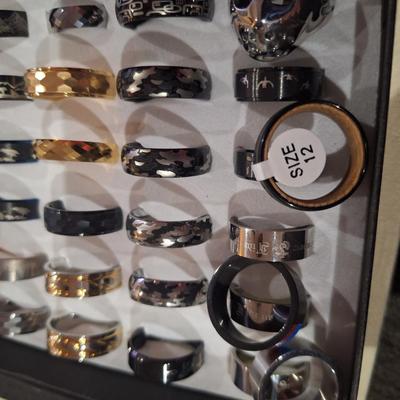 assorted stainless steel and tungsten rings