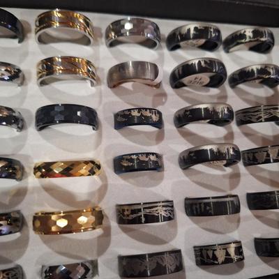 assorted stainless steel and tungsten rings