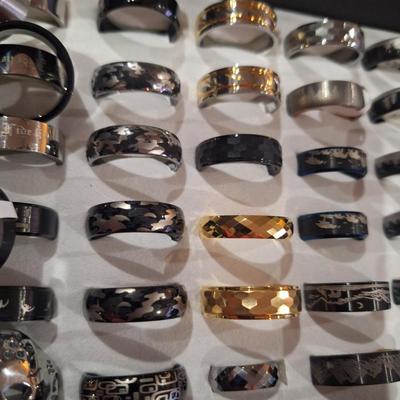assorted stainless steel and tungsten rings