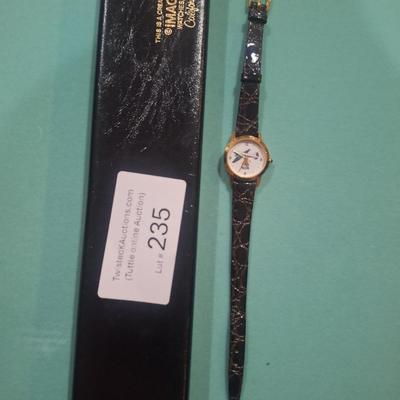 vintage fossil watch featuring douglas DC-3 aircraft