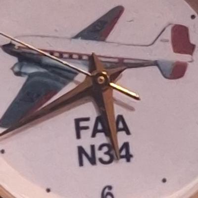 vintage fossil watch featuring douglas DC-3 aircraft
