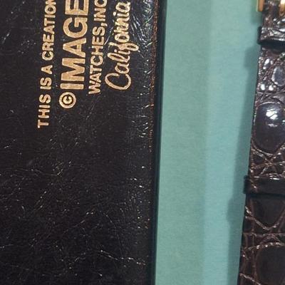 vintage fossil watch featuring douglas DC-3 aircraft