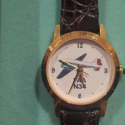 vintage fossil watch featuring douglas DC-3 aircraft