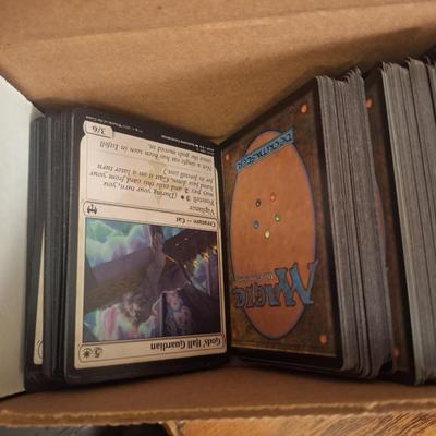 box of Magic the Gathering trading cards.