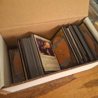 box of Magic the Gathering trading cards.