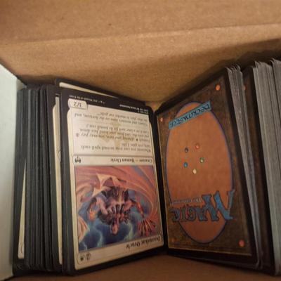 box of Magic the Gathering trading cards.