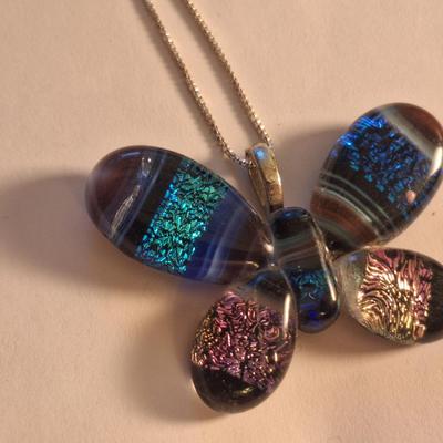 Butterlfy pendant necklace on sterling silver chain.