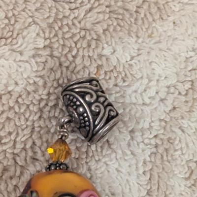 vintage pendant with oval stone and pink rose embellishments