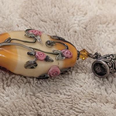 vintage pendant with oval stone and pink rose embellishments