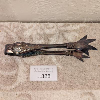 vintage silverplate sugar tongs with talon or claw style ends. By Wallace