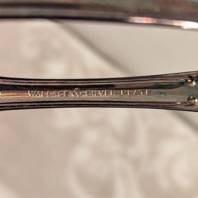 vintage silverplate sugar tongs with talon or claw style ends. By Wallace