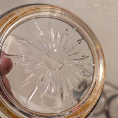 four vintage Italian Leonard silver-plated glass coasters with a starburst design