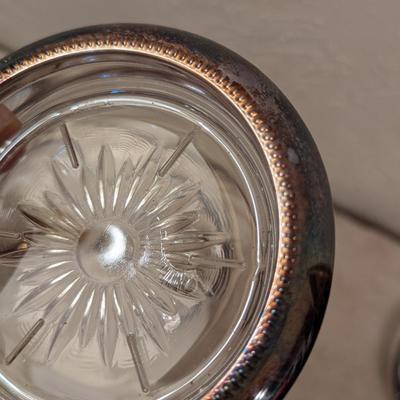 four vintage Italian Leonard silver-plated glass coasters with a starburst design