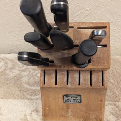 parital set of chicago cutlery knives and wooden block see all photos.