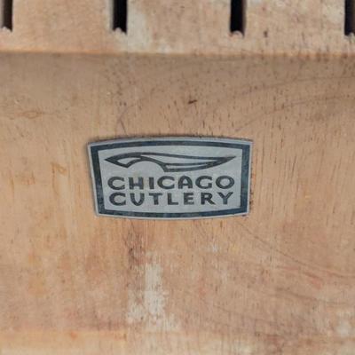 parital set of chicago cutlery knives and wooden block see all photos.