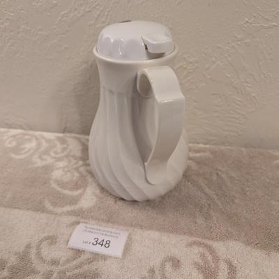 Connoisserve white insulated carafe or beverage server with a swirl design