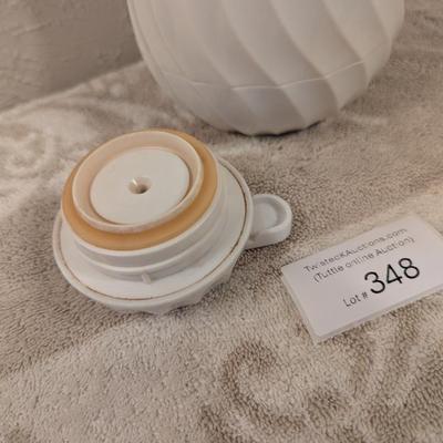 Connoisserve white insulated carafe or beverage server with a swirl design