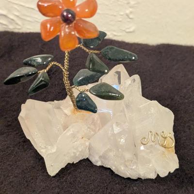hand made flower on a piece of quartz