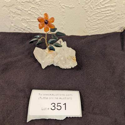 hand made flower on a piece of quartz
