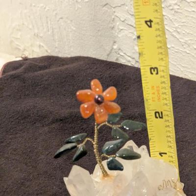 hand made flower on a piece of quartz