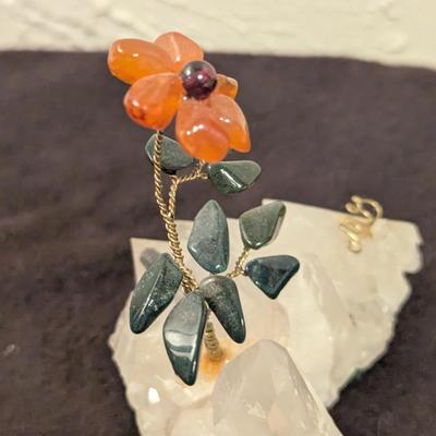 hand made flower on a piece of quartz