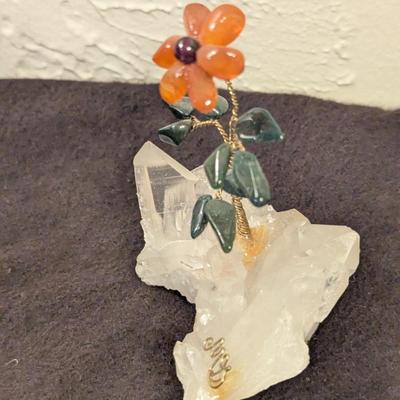 hand made flower on a piece of quartz