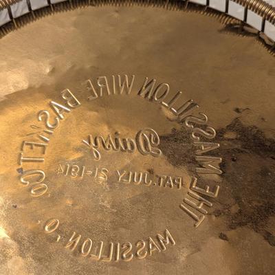 antique "Daisy" wire waste basket made by The Massillon Wire Basket Co. in Massillon, Ohio, which features a patent date of...